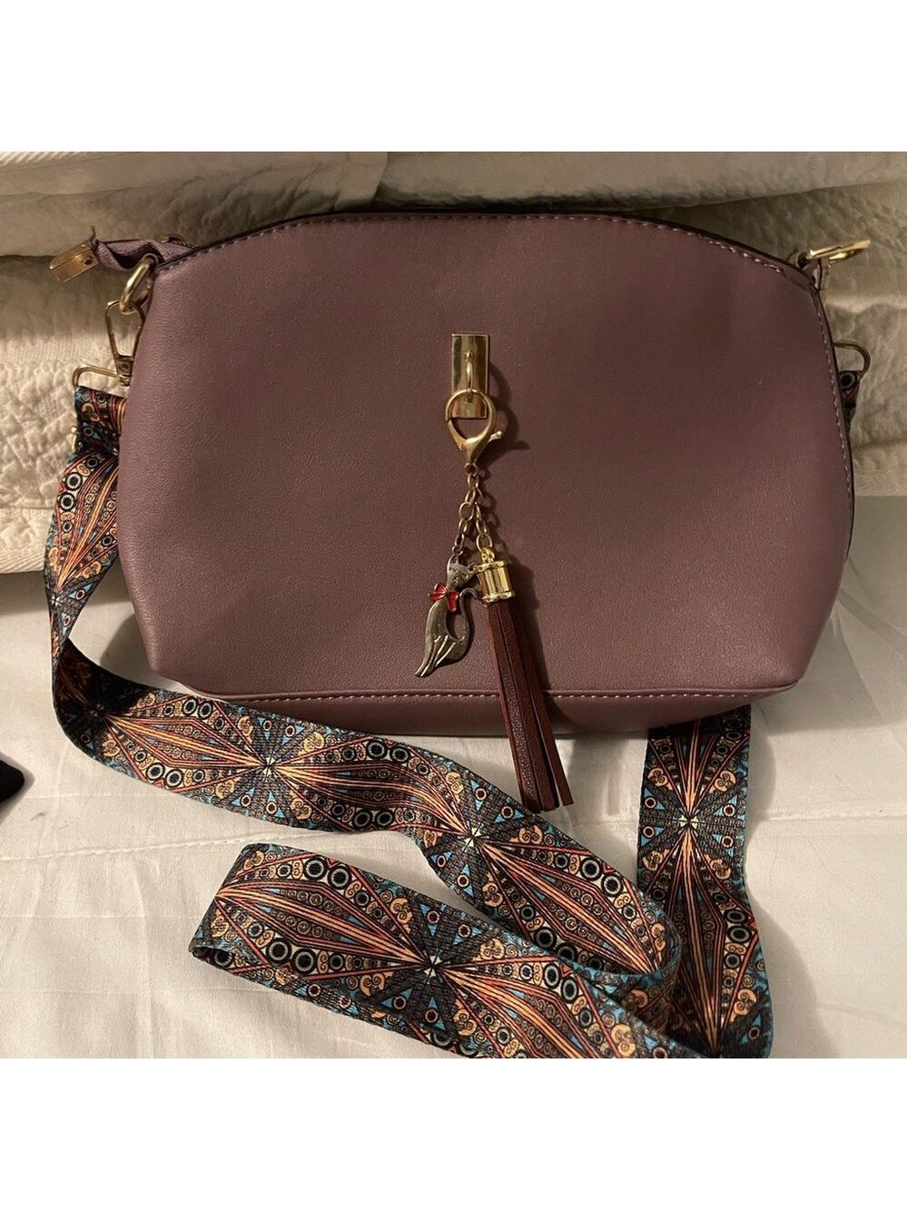 Chic Mauve Crossbody Bag with Patterned Strap and cat charm
